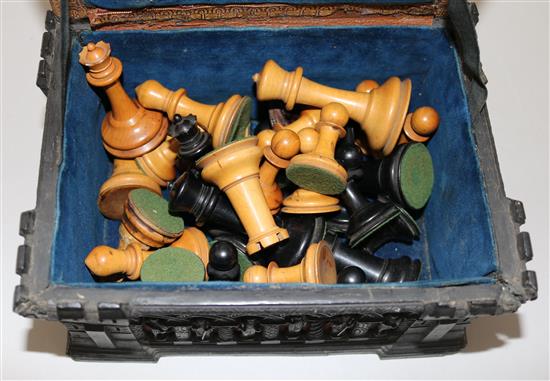 A Staunton ebony and boxwood chess set by Jaques of London, in carton pierre casket, (a.f.).